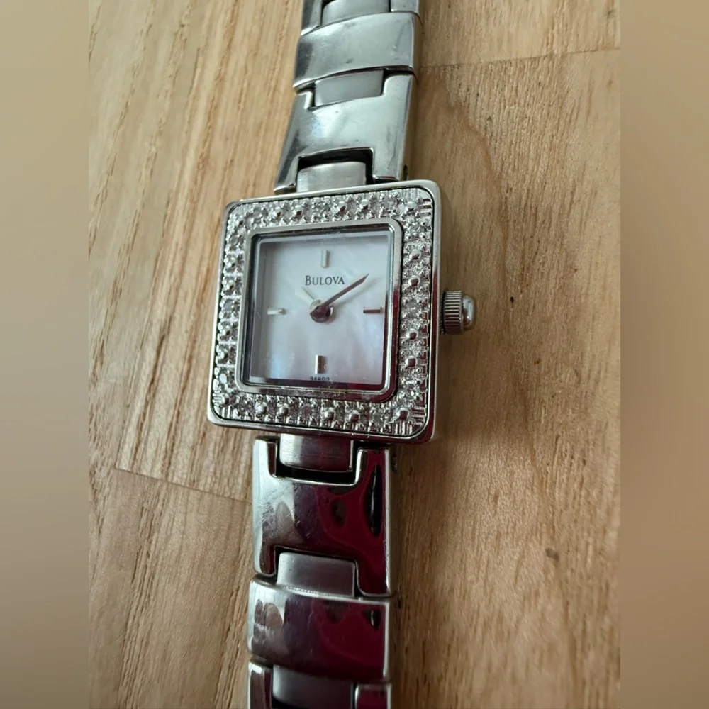 Dainty Bulova ladies square silver tone watch NEW BATTERY